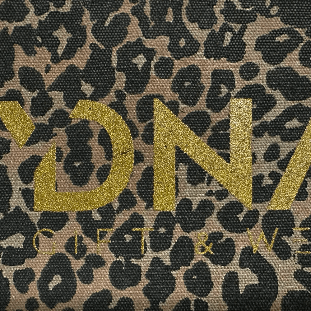 IMMAGINE STAMPA ORO SU TESSUTO LEOPARDATO